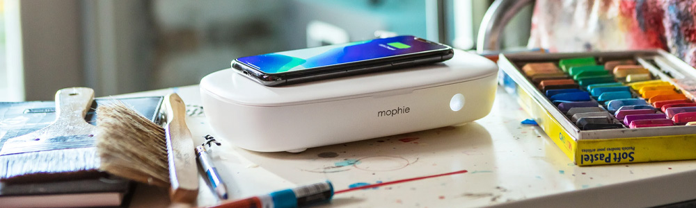 Phone on top of mophie UV Sanitizer