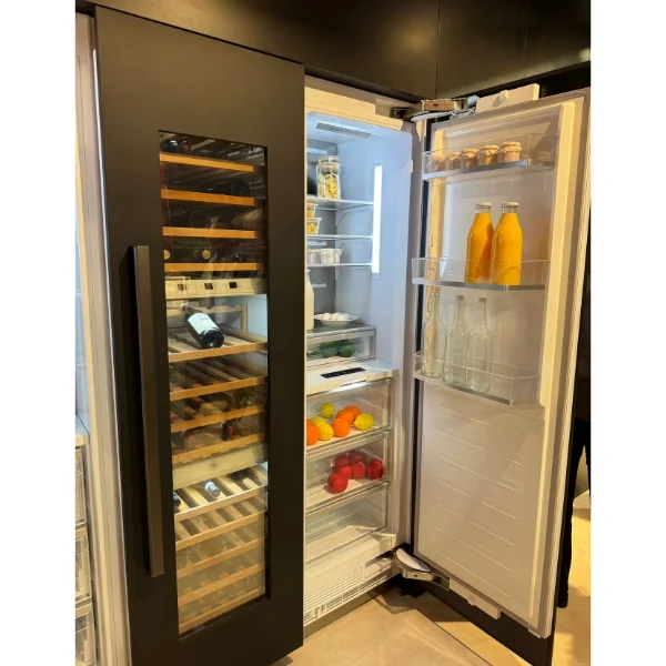 A Bertazzoni wine refrigerator column and a Bertazzoni refrigerator both in the Carbonio finish installed next to each other