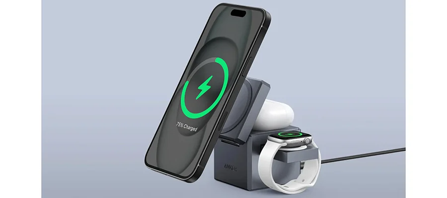An iPhone, Apple Watch and AirPods sitting on the Anker 3-in-1 MagSafe charger