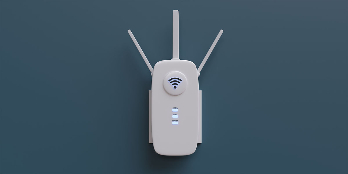 Wi-Fi booster plugged into wall.