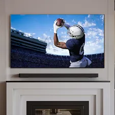 TV mounted above fireplace