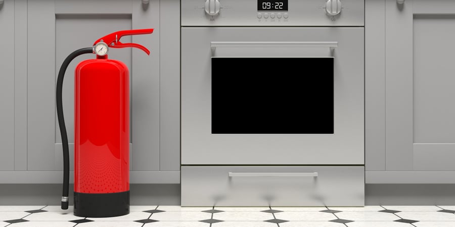 Fire Extinguisher Next to Oven