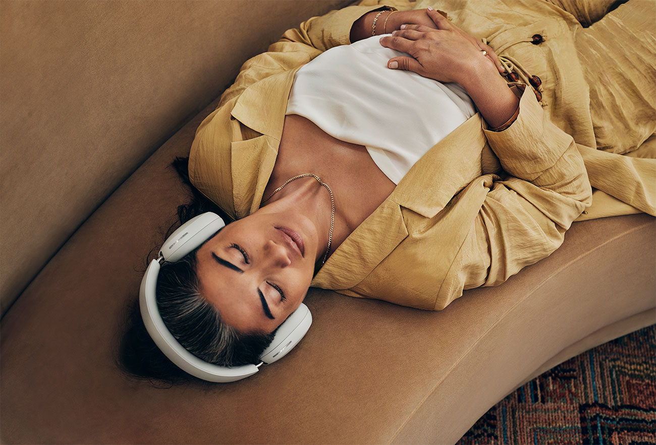 Woman Using Sonos Noise Cancelling Headphones Indoors