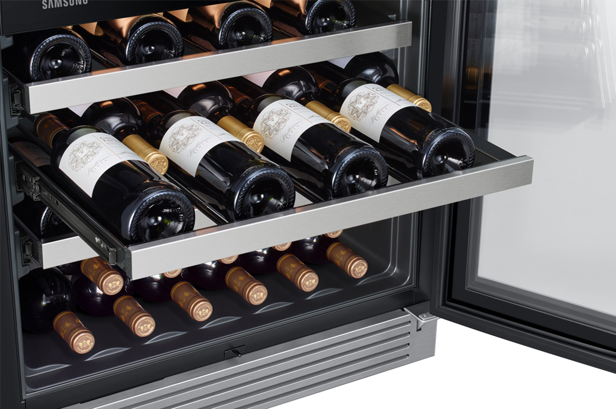 Angle view of rack pulled out with wine bottles on it.