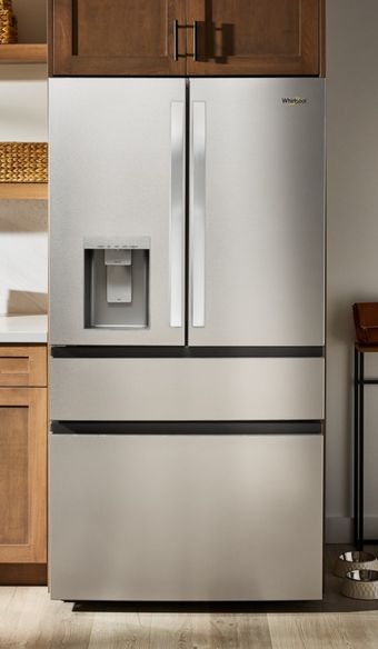 Tight shot of a whirlpool side by side built in refrigerator