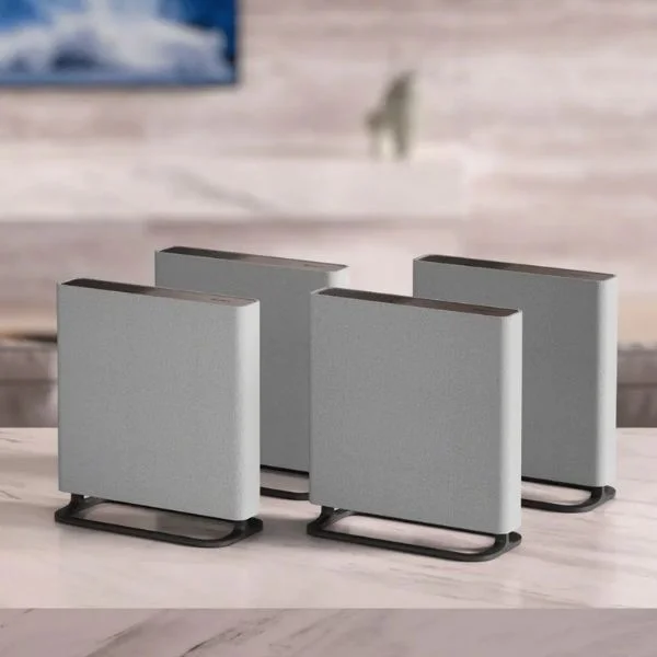 The four Bravia Theater Quad speakers on a table.
