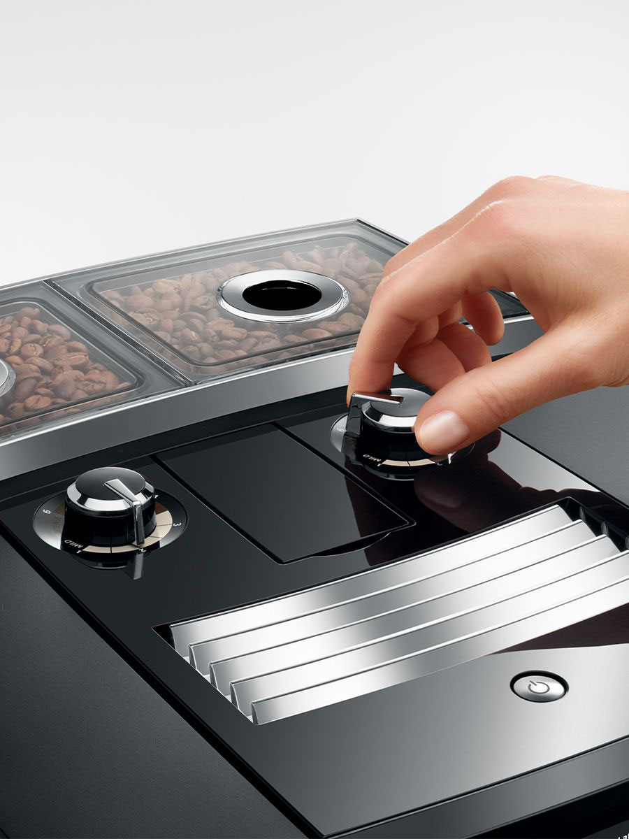 Person Using Coffee and Espresso Machine
