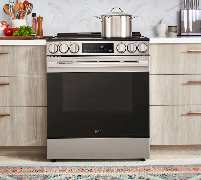 Kitchen range and dishwasher under stone counters