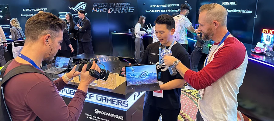 An ASUS rep showing our team the ASUS ROG Flow Z13 gaming tablet at CES 2025