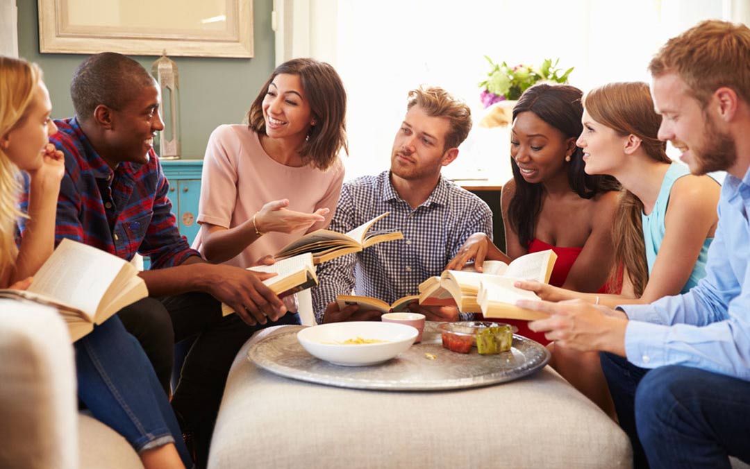 Group of Friends Reading Together