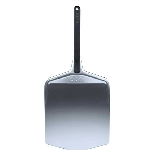 A stainless steel pizza peel with a black handle