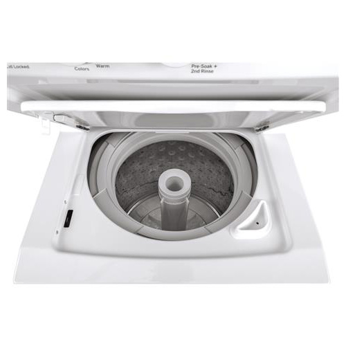Open washer lid with nothing inside.