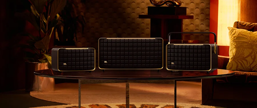 The JBL Authentics speaker line sitting on a glass table