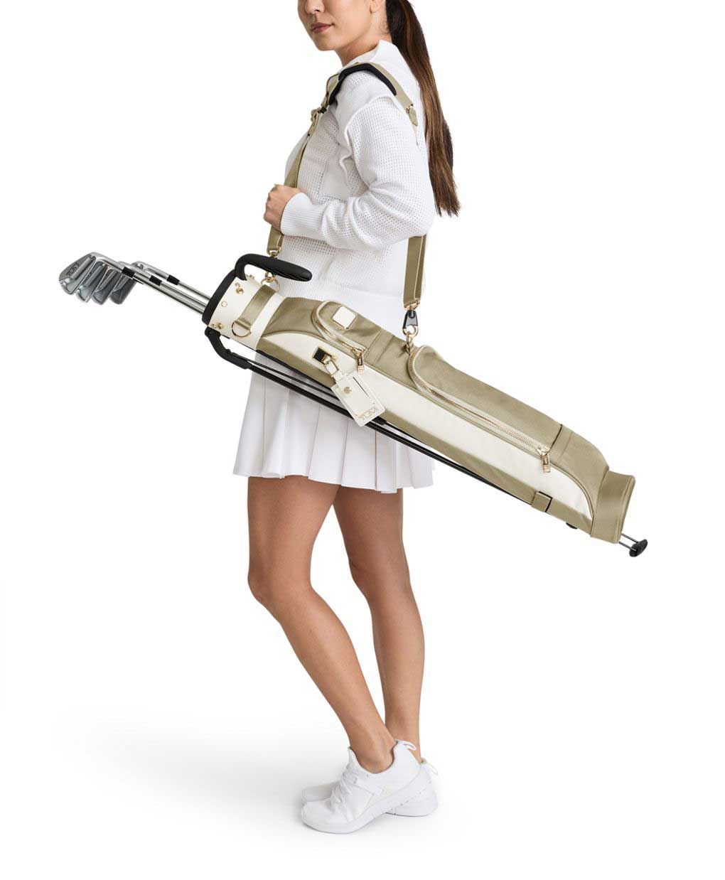 View of TUMI Golf bag with person holding it