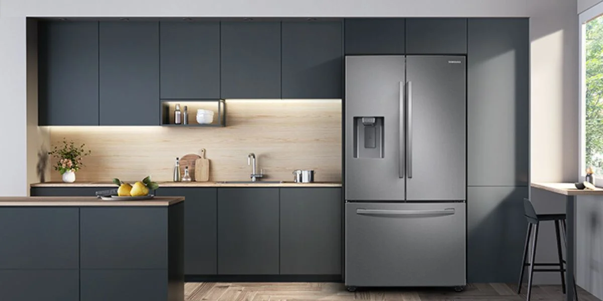 Front View of a Samsung French Door Refrigerator in a Gray kitchen