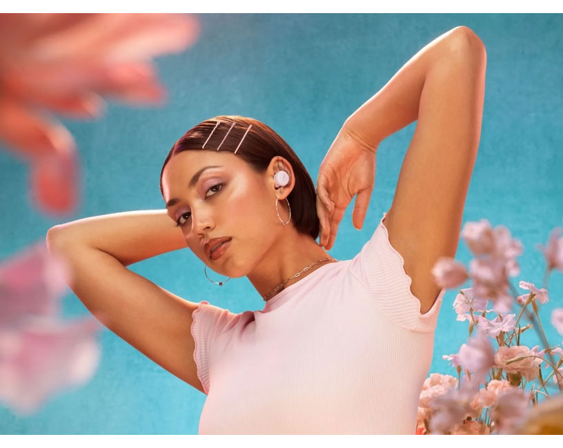 Woman Using Bose Noise Cancelling Earbuds