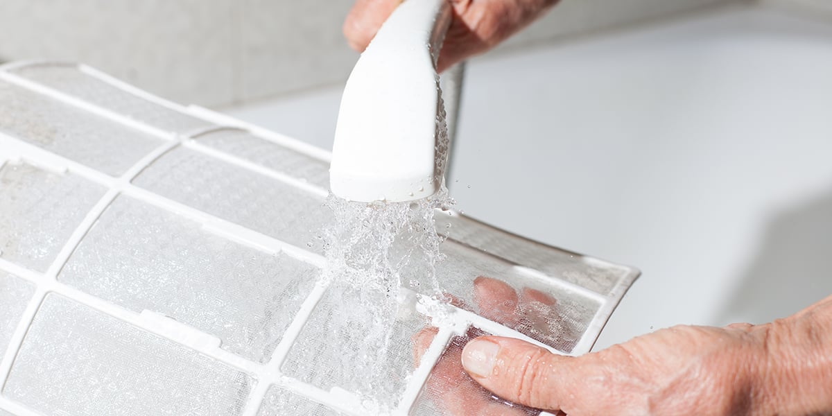 Water running over an air conditioner filter