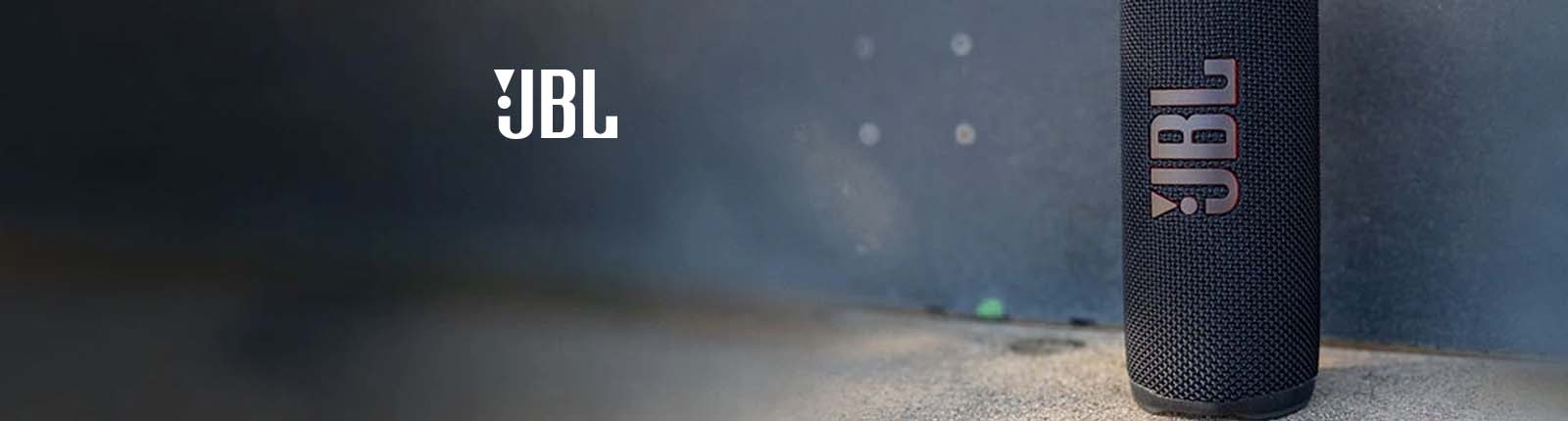 Lifestyle closeup of JBL portable speaker