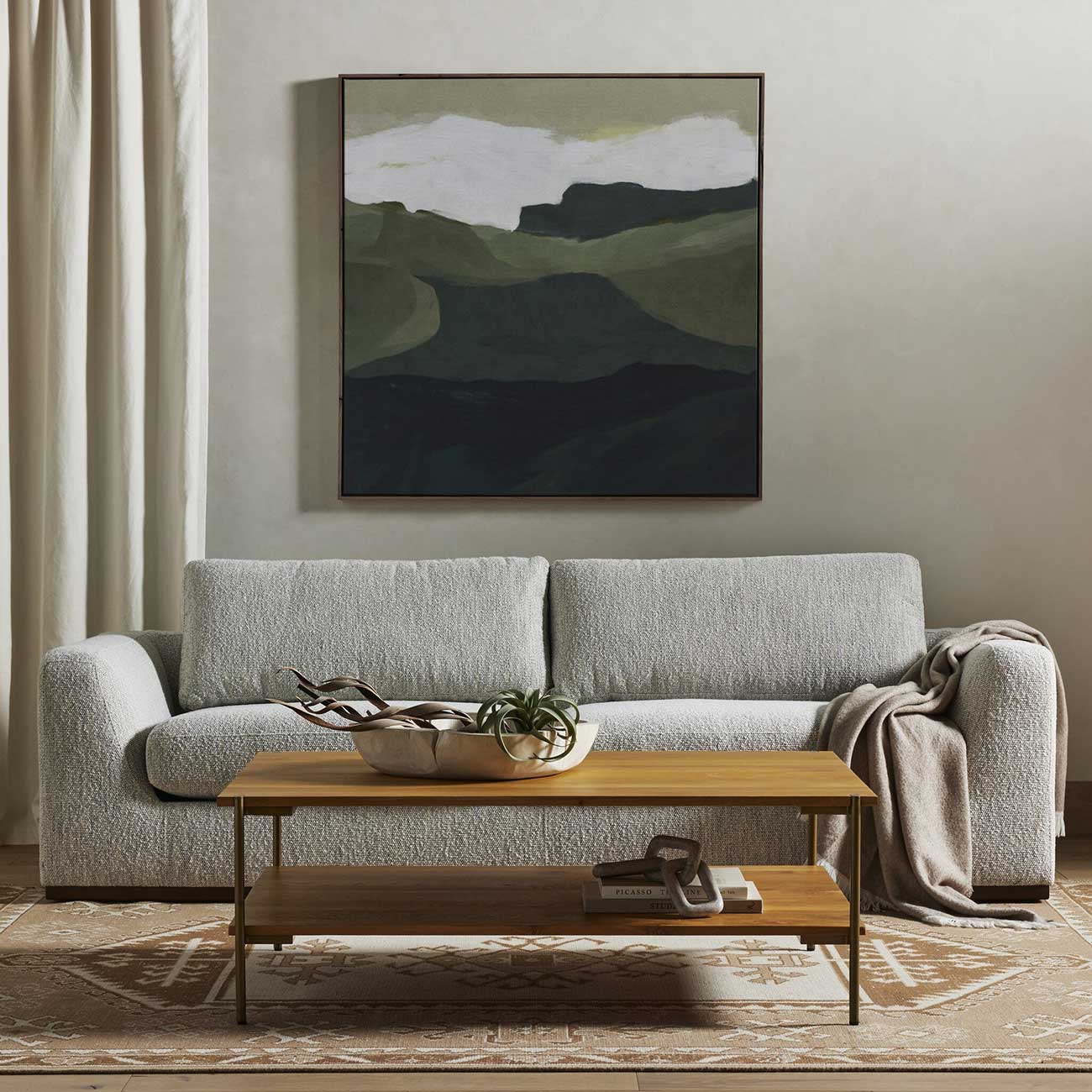 View of four hands sofa in living room