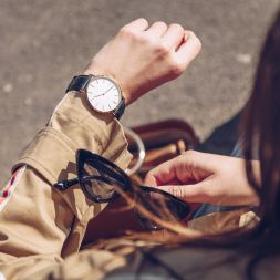 Woman with watch and glasses