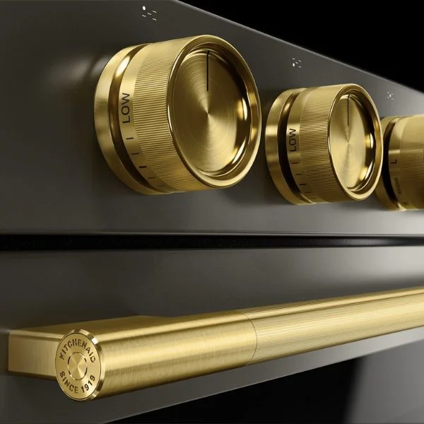 Closeup of brass hardware on KitchenAid Black Ore range