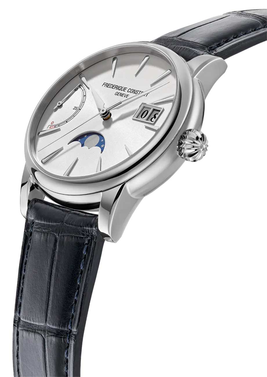 Angled view of silver dial and blue strap watch