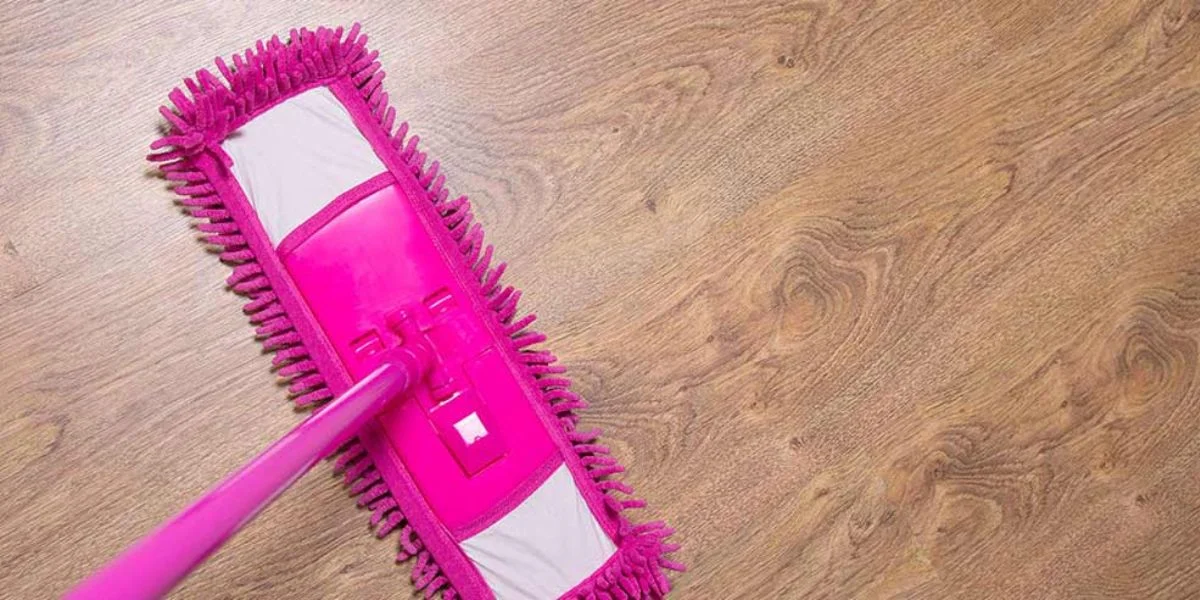 Pink Mop on Hardwood Kitchen Floor