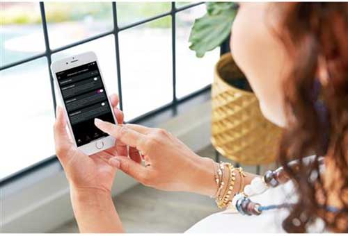 Smartphone being used for control settings.