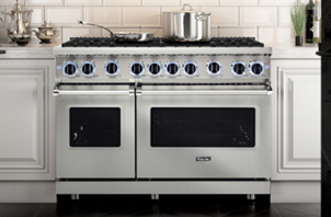 Close up view of stainless steel gas range