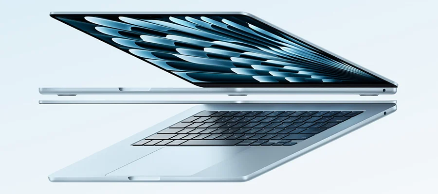 Two Apple 15.3 inch MacBook Air laptops in the sky blue finish