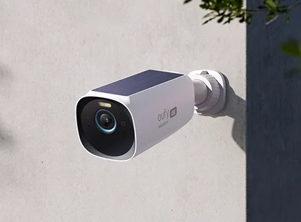 A commercial security camera mounted on a building