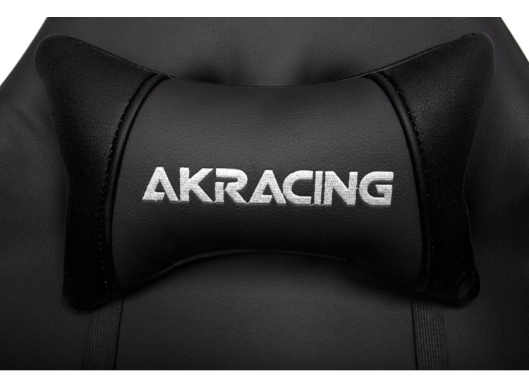 Technical schematic showing dimensions of AKRACING chair from front and side