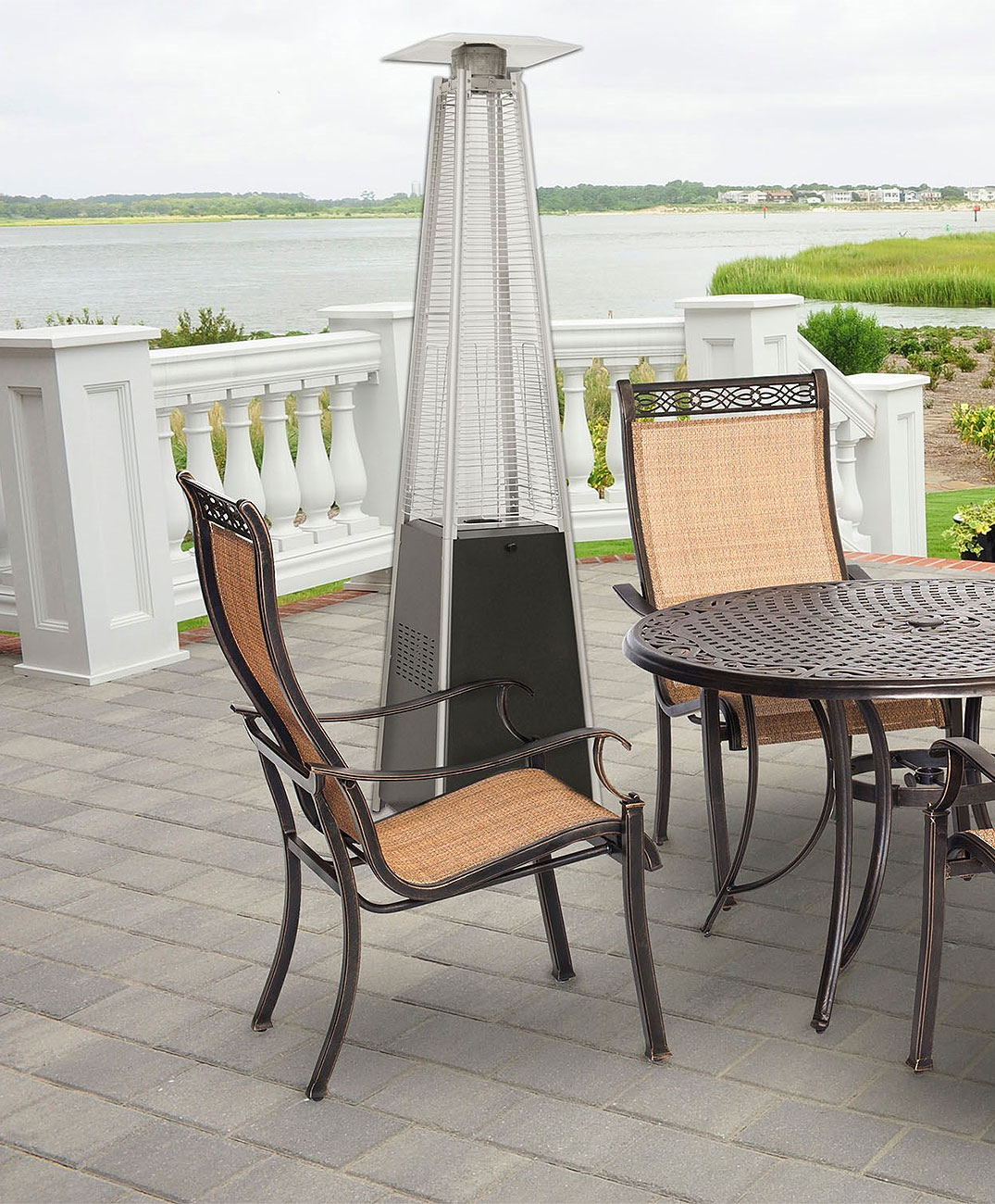 Right angle view of patio heater outside next to table