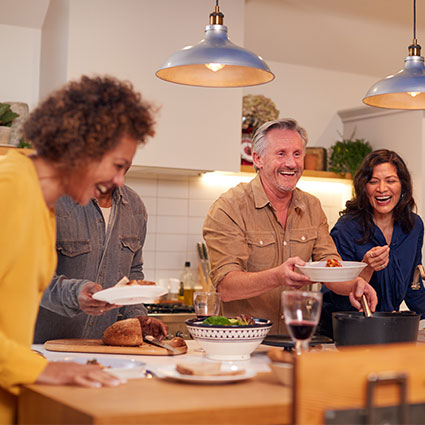 Friends and family enjoying dinner