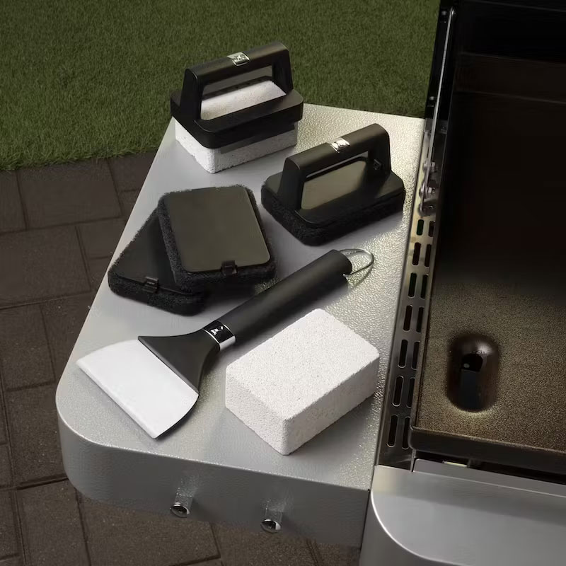 Cleaning kit on grill.
