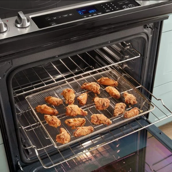 Close-up close up of the pro sear infrared burners on a lynx grill with filets griling on the burnersr