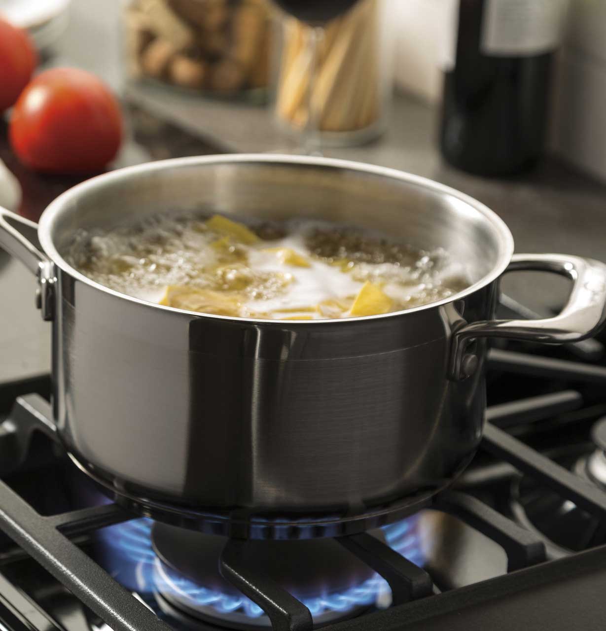 View Of Pot Simmering Above GE Gas Range