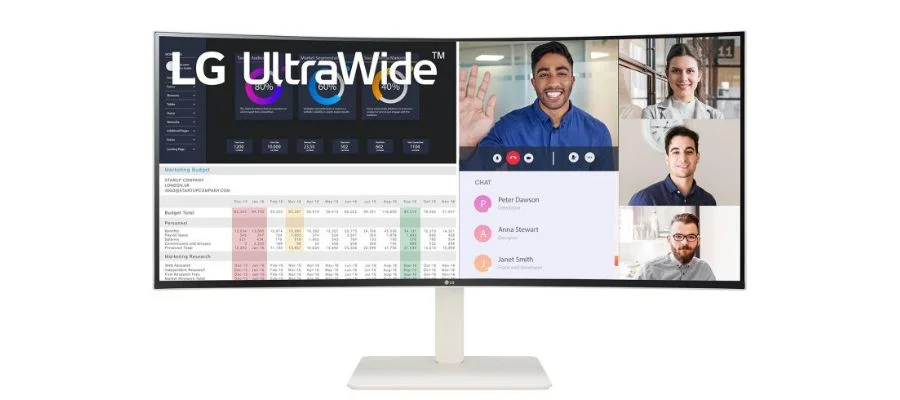 An image of the monitor with a video call on one side and a spreadsheet on the other