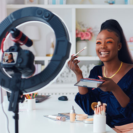 Ring light, girl doing her makeup