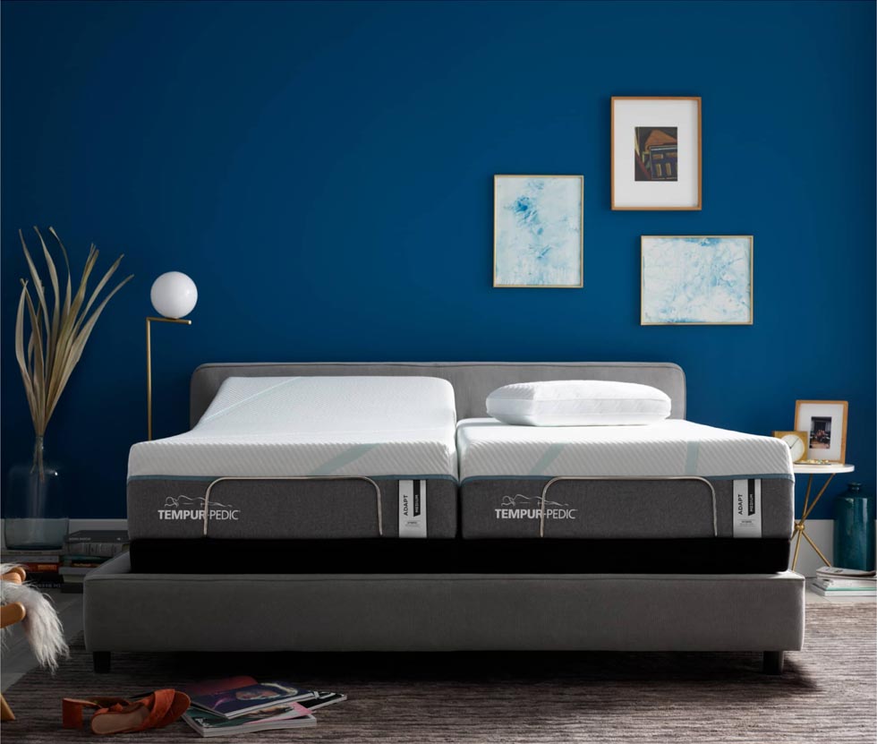 Two Tempur-Pedic beds with adjustable bedframes