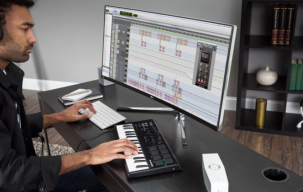 Person suing an ultrawide computer monitor