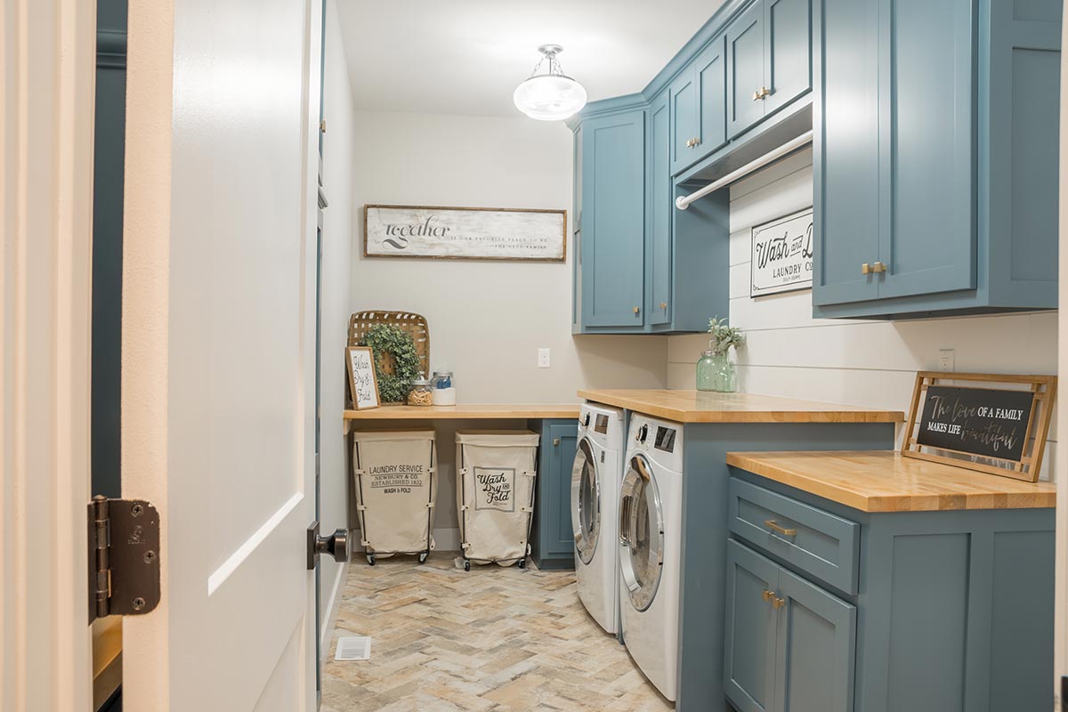 Laundry Room with Silver Washer and Dryer