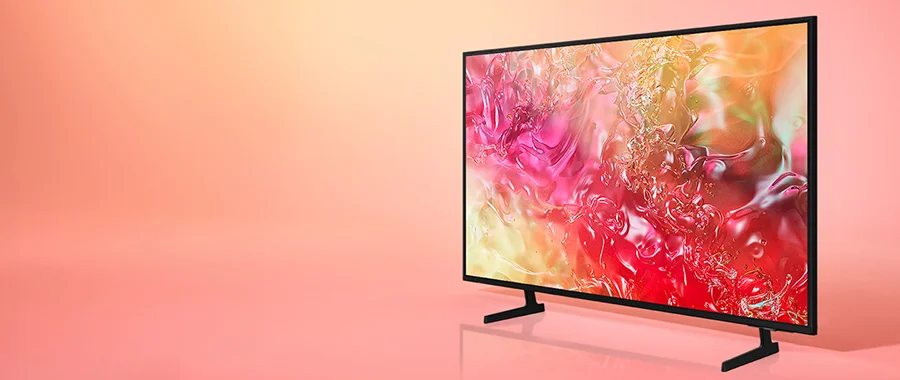 The Samsung DU7200 TV in front of a pink background