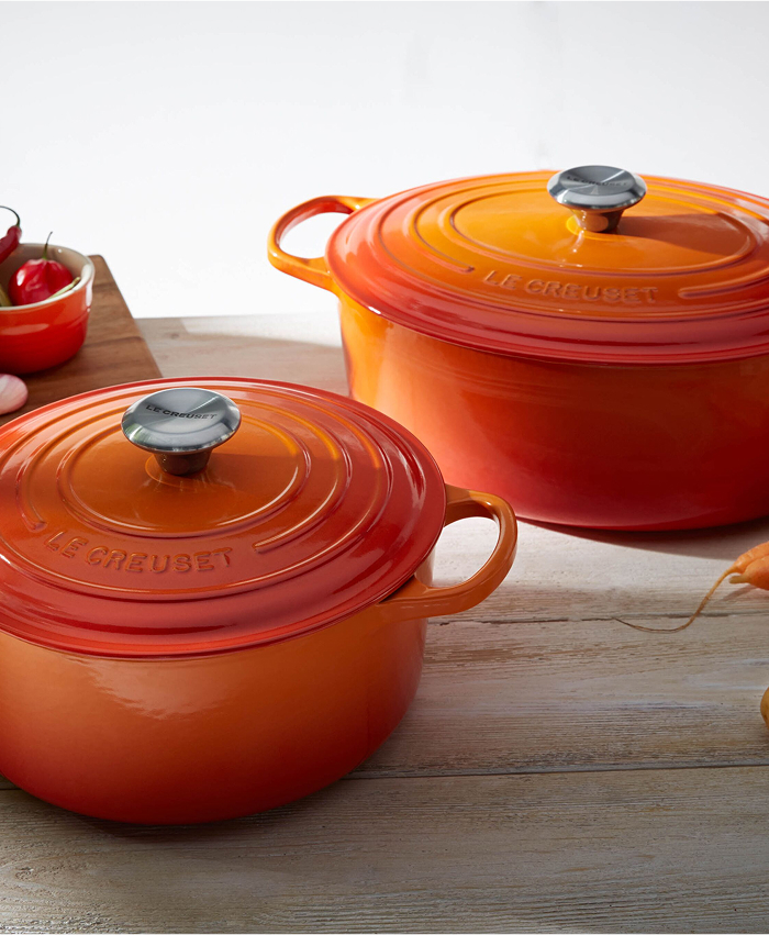 Two Orange Dutch Ovens