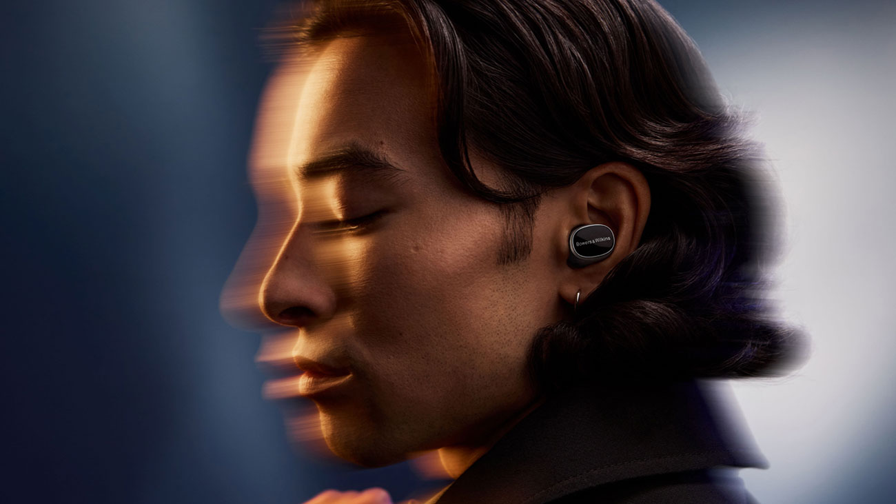 Man Using Bowers and Wilkins In-Ear Earbuds