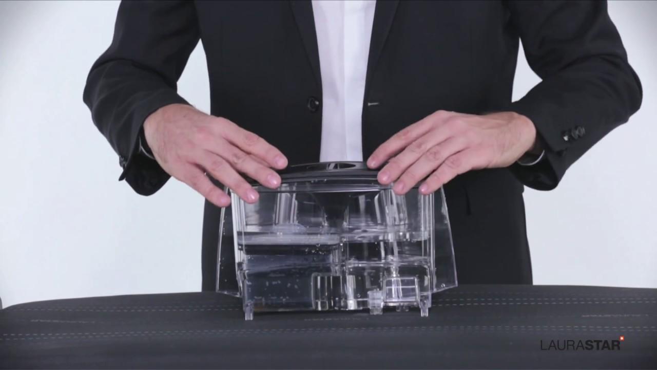 Watch How to fill the water filter with anti-scale granules: Laurastar Smart