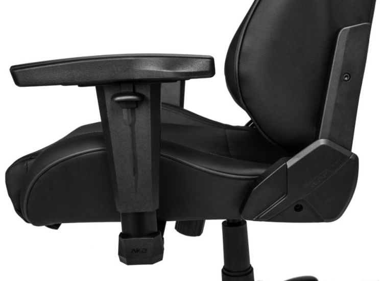 Angular back view of black gaming chair with AKRACING branding