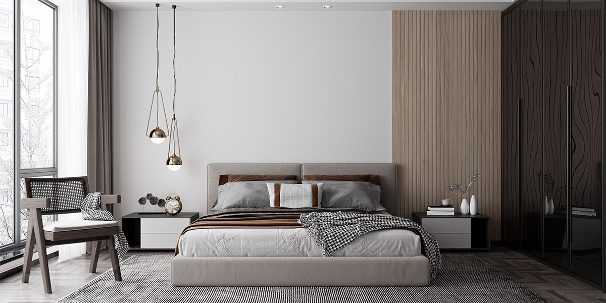 Picture of a bedroom with bed, two nightstands and chair.