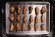 Aerial view of tray of wings pm rack after cooking