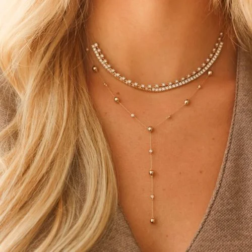 Warm colored tight shot on a necklace stack from Dana Rebecca